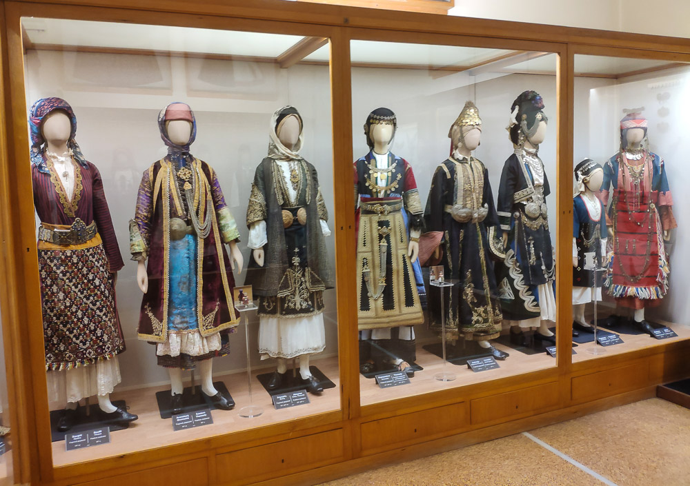 Image showing traditional Greek costumes on display at the National Historical Museum of Greece.